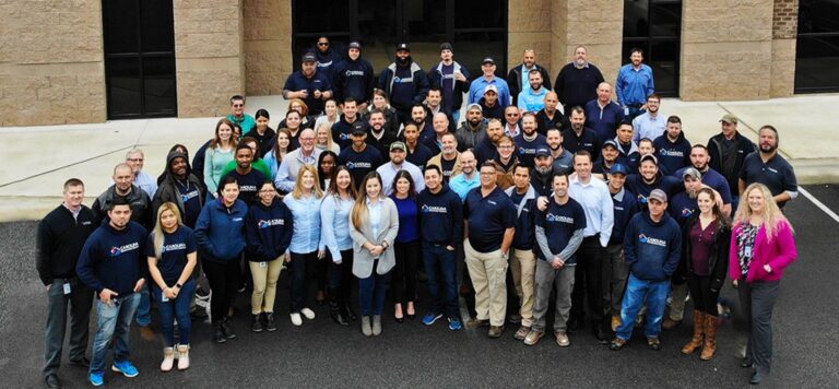 Large group photo of Carolina Roofing Systems employees.