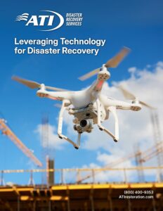 Drone flying over a construction site; ATI Disaster Recovery Services logo.
